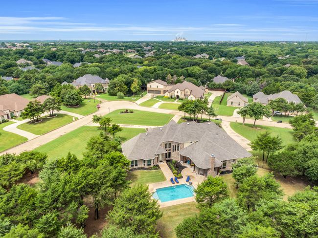 Aerial view of residential area with a pool area | Image 40