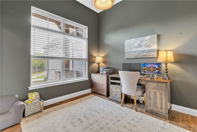 Large picture window overlooking the expansive front yard for loads of natural light. | Image 7
