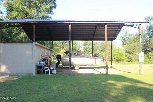 6562 Messer Rd, House other with 3 bedrooms, 2 bathrooms and null parking in Grand Ridge FL | Image 16