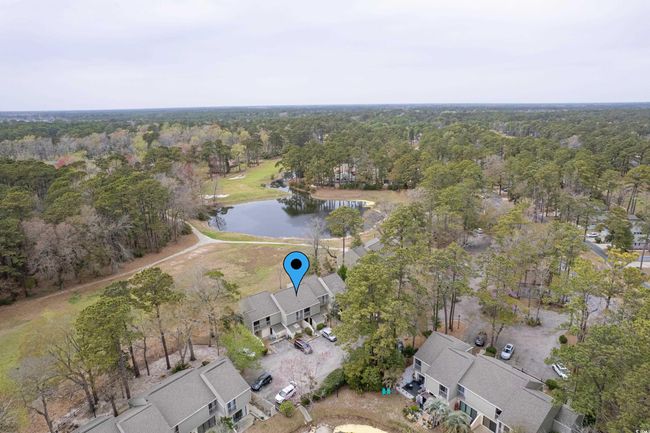 Aerial view with a water view and a wooded view | Image 30