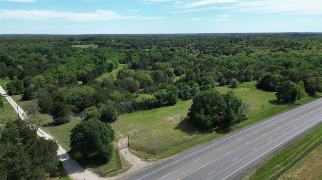 Birds eye view of property featuring a view of trees | Image 7