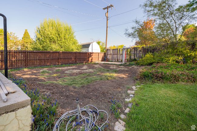View of yard featuring a fenced backyard | Image 9