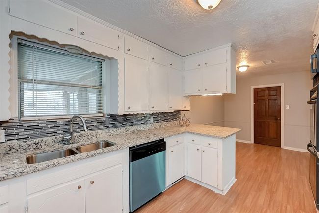 Open Concept Kitchen and Breakfast Room | Image 4