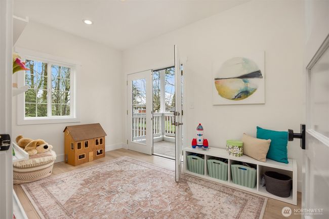 Main floor room can be used as an office or a sweet kids playroom. | Image 16