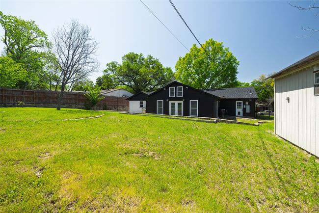 View of yard with fence | Image 38