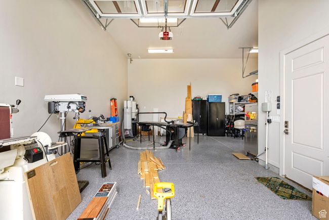 Garage with a garage door opener | Image 130
