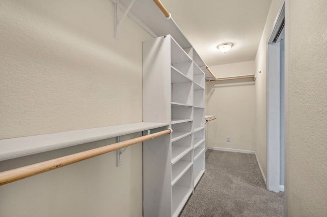 Walk in closet with storage | Image 21