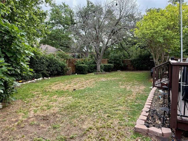 View of yard with a fenced backyard | Image 38