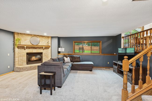 Spacious lower level living area, perfect for movie nights or gatherings | Image 29