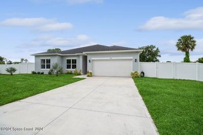 900 Coquina Street Se, House other with 4 bedrooms, 3 bathrooms and null parking in Palm Bay FL | Image 3