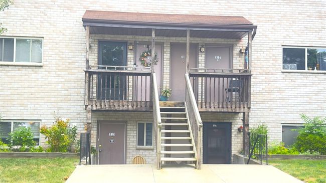 View of property with stairway to first floor | Image 16