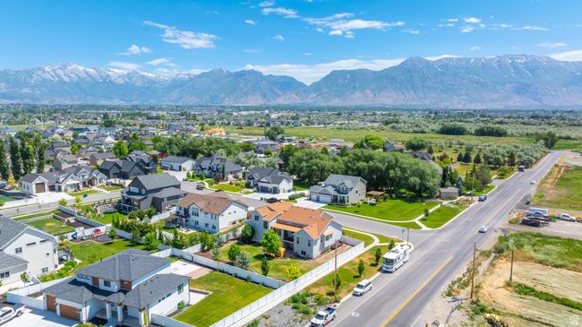 Aerial view of residential area featuring mountains | Image 41