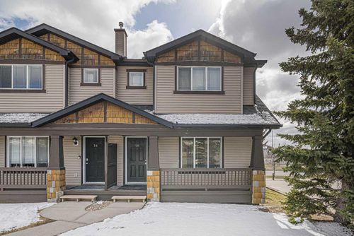 50 Panatella Park Nw, Home with 4 bedrooms, 2 bathrooms and 2 parking in Calgary AB | Card Image