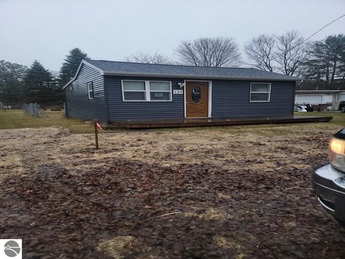 124 N Wheeler St, Oscoda, MI, 48750-1452 | Card Image