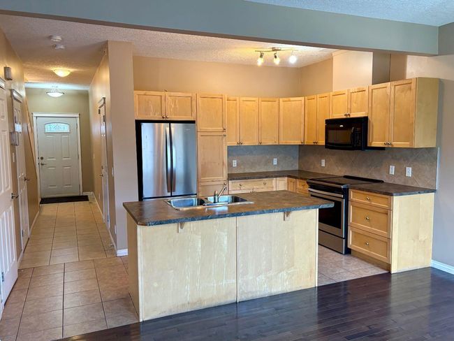703 - 620 Luxstone Landing Sw, Townhouse with 3 bedrooms, 3 bathrooms and 2 parking in Airdrie AB | Image 5