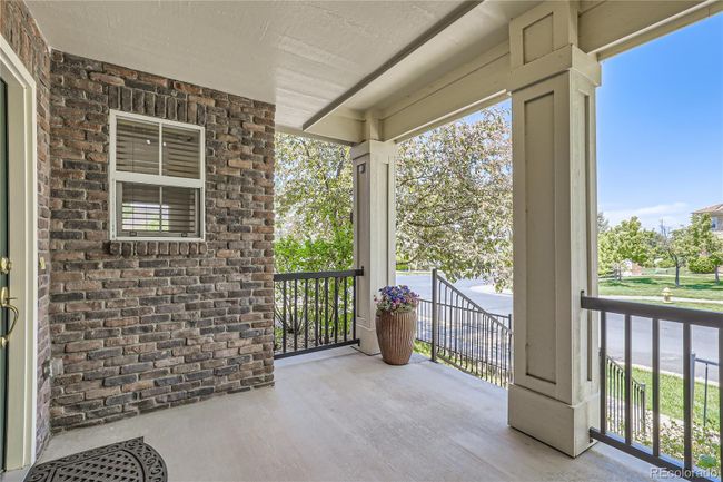 Large covered front porch | Image 4