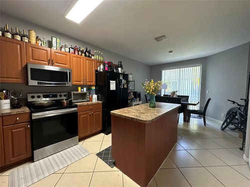1920 Hibiscus Ln, Riviera Beach, FL, 33404-1873 | Card Image