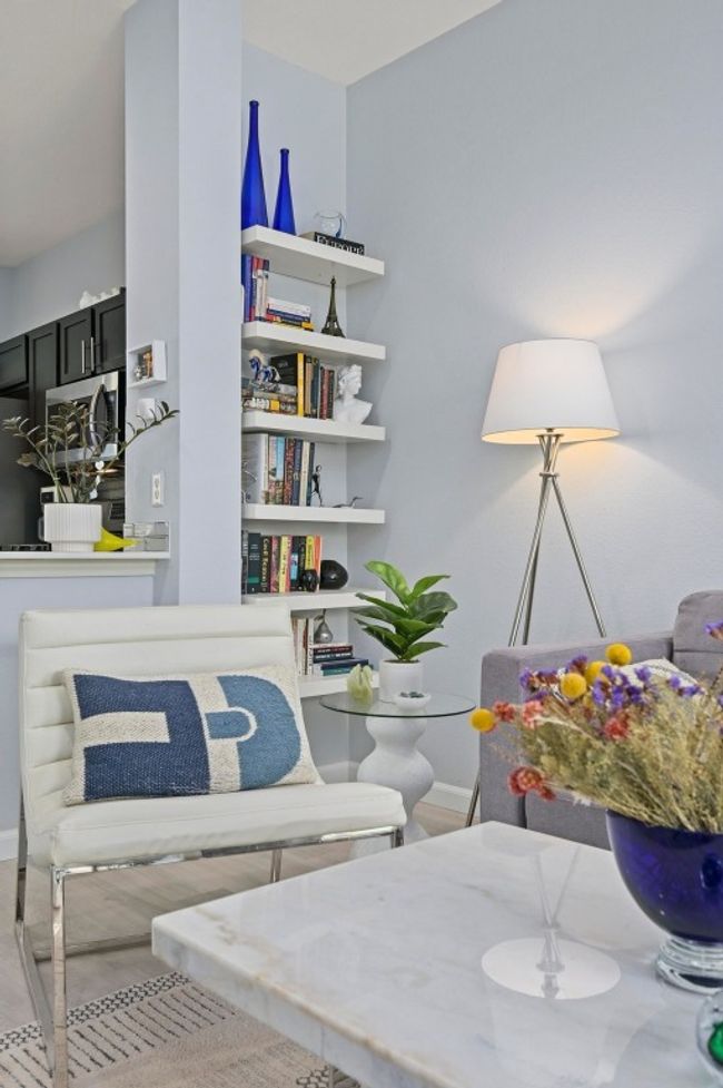 Living area featuring wood finished floors and baseboards | Image 15