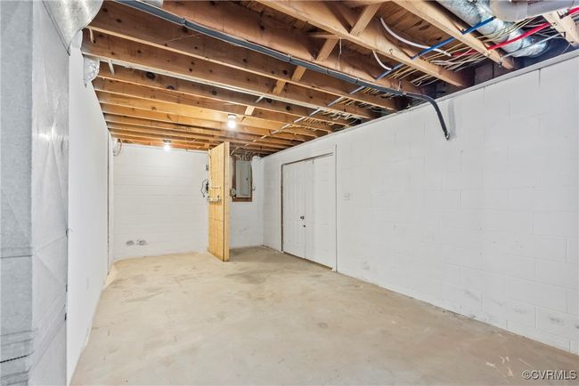 Unfinished below grade area featuring electric panel | Image 29
