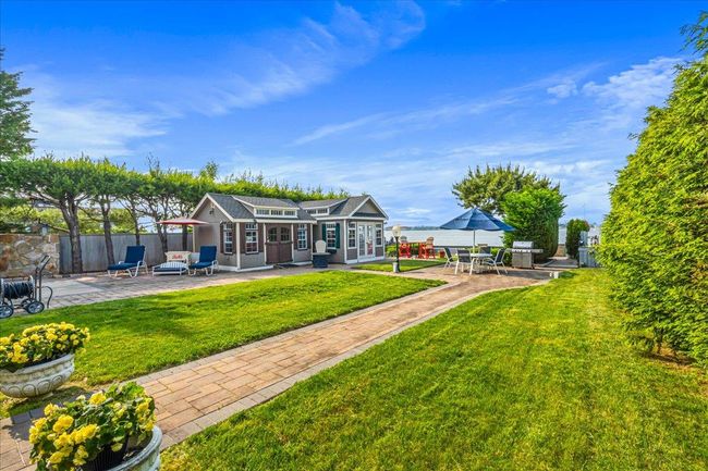 View of yard with a patio | Image 29