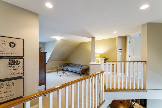 Corridor with carpet flooring, recessed lighting, baseboards, and an upstairs landing | Image 16