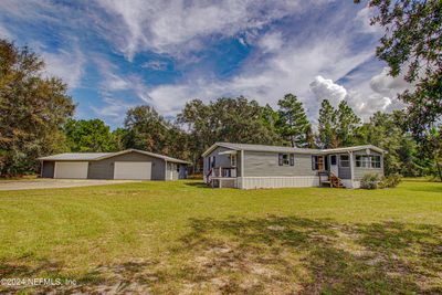 7677 Oak Forest Road, House other with 3 bedrooms, 2 bathrooms and null parking in Keystone Heights FL | Image 1