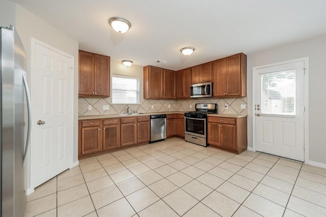 8319 Loetsch Ridge Way, House other with 4 bedrooms, 3 bathrooms and 2 parking in Spring TX | Image 7