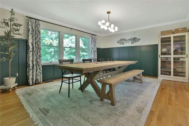 The formal dining room was recently renovated, and has plenty of room for all your family and friends. | Image 7