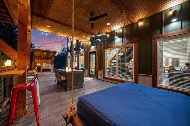 outdoor cooking and bar area | Image 25