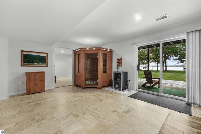 11246 Kings Point Rd, House other with 4 bedrooms, 3 bathrooms and null parking in Alanson MI | Image 45