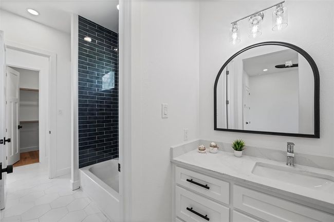 Stylish Jack & Jill bathroom with modern finishes and convenient dual access. | Image 40