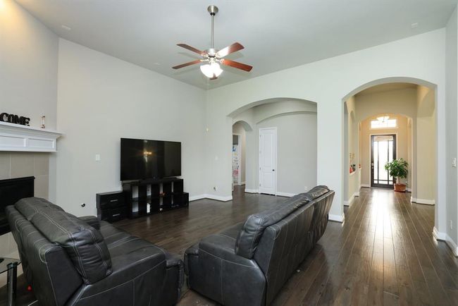 door to storage closet and hallway to bedroom 3 and primary bedroom. Also laundry room and full bath | Image 20