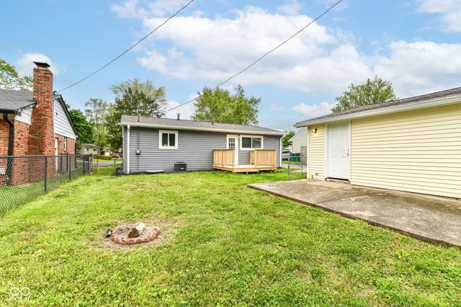 back of property featuring a deck, a patio area, and cooling unit | Image 36