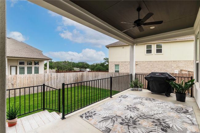 View of patio featuring ceiling fan, grilling area, and fence private yard | Image 24