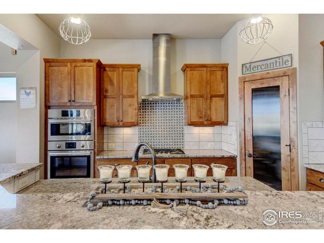6940 Summerwind Ct, House other with 4 bedrooms, 3 bathrooms and null parking in Timnath CO | Image 11