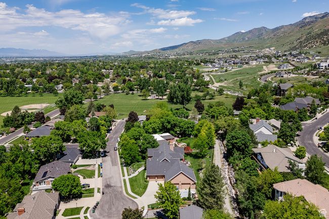 Aerial perspective of suburban area with a mountain backdrop | Image 108