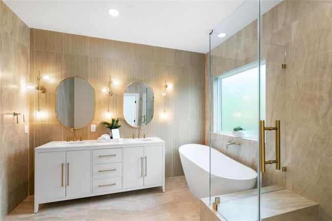 Stunning bathroom with double vanities, soaking tub and separate shower. | Image 27