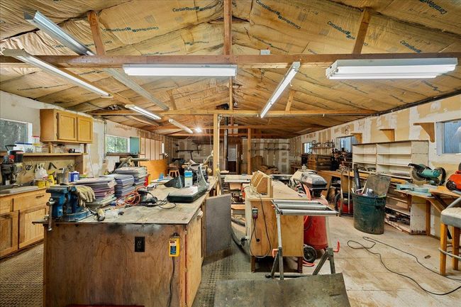 Interior of workshop. Large space with 220 power and ample cabinetry | Image 70