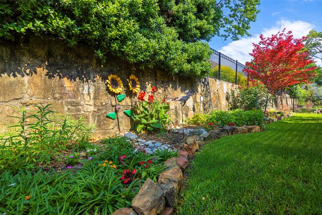Beautiful landscaped garden beds and lawn. | Image 30