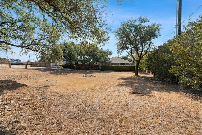 View of yard with fence | Image 25