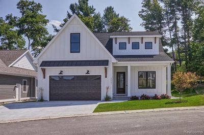 13921 S Winding Trail, Home with 3 bedrooms, 2 bathrooms and null parking in Traverse City MI | Image 1