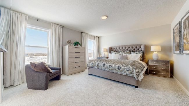 (Photo of a model home, actual features may vary) Spacious, imaginative and modern would best describe an owner's suite. This suite offers a serene setting and includes private access to a en-suite bath and walk-in closet. | Image 9