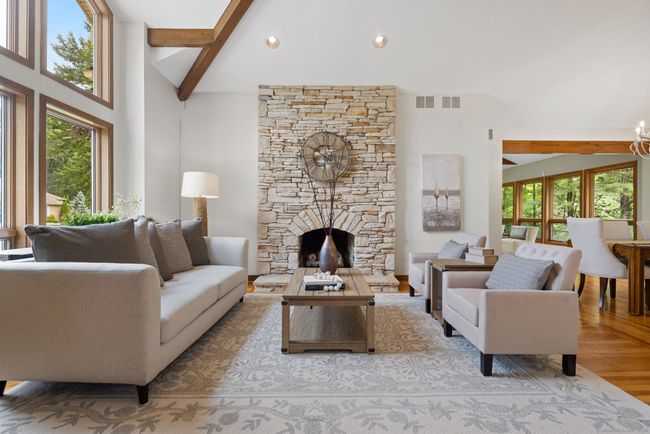 Living Room with vaulted ceilings and gorgeous stone fireplace | Image 9
