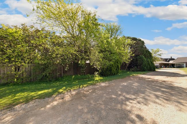 View of street with driveway | Image 17