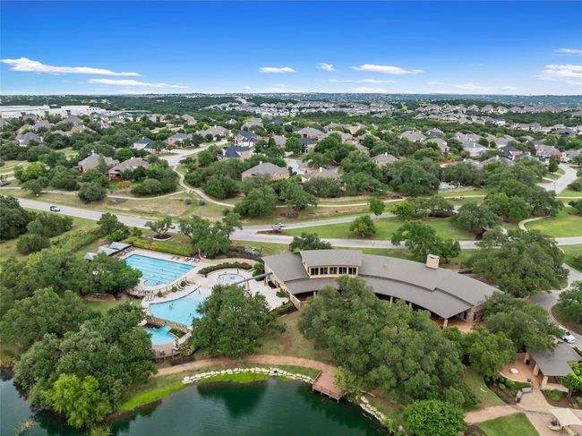 Aerial overview of property's location with a large body of water and a pool | Image 39