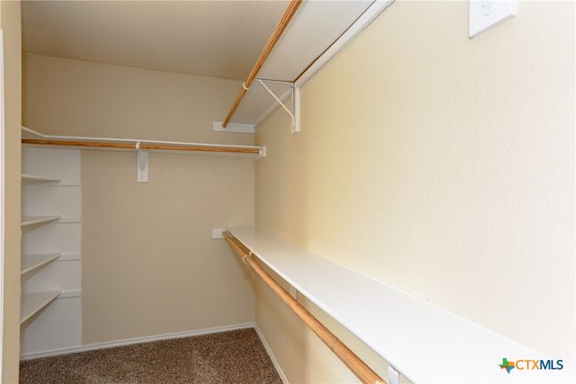 Large walk-in closet in primary bedroom | Image 35