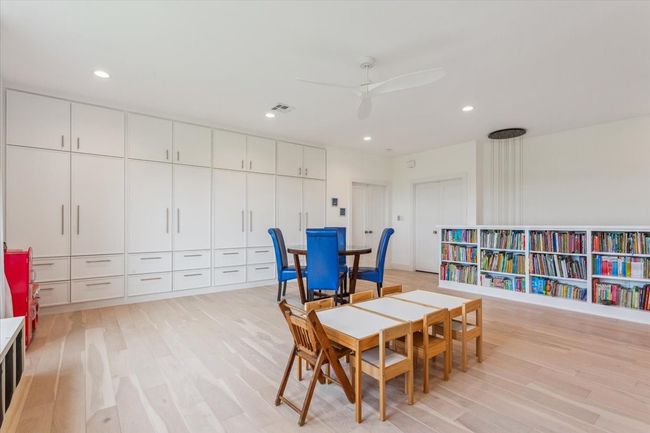 Recreation room featuring light wood finished floors, recessed lighting, and a ceiling fan | Image 22