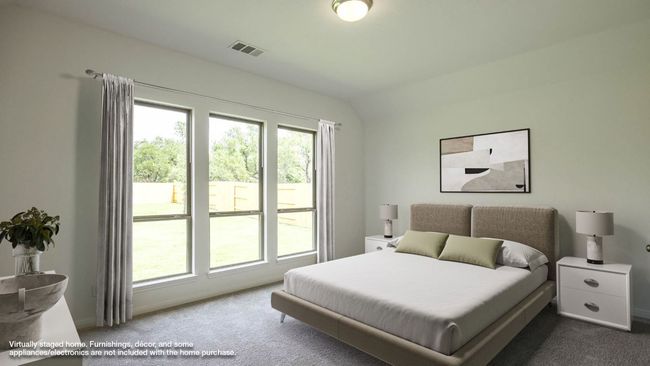 Carpeted bedroom with baseboards and vaulted ceiling | Image 4