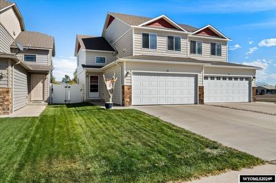 70 B 28th Street, Townhouse with 3 bedrooms, 3 bathrooms and null parking in Wheatland WY | Image 1