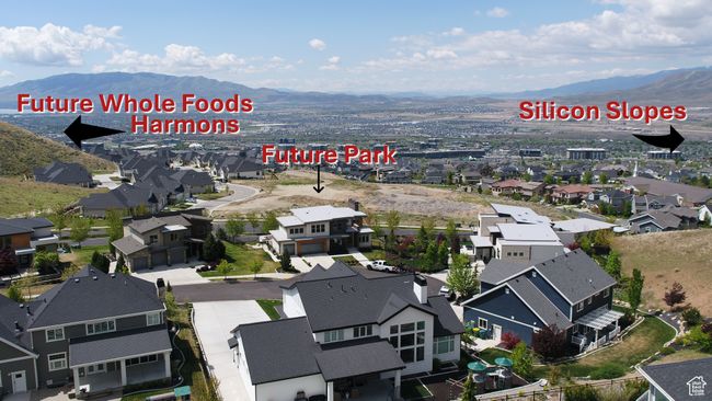 Aerial view of residential area with a mountainous background | Image 5